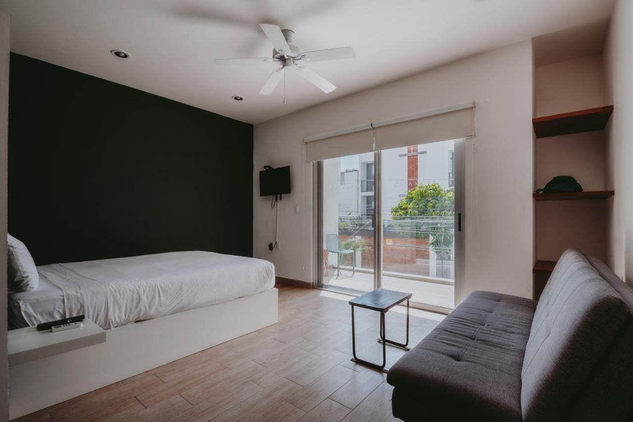 Mora & By Kalma Apartahotel